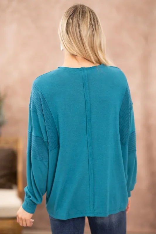 teal-reverse-seam-detail-v-neck-top